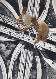 two men are standing on top of an overhead view of the highway and freeways