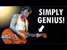 a man playing an orange guitar with the words simply genius