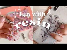 someone is holding their phone case with the words fun with resinin on it and an image