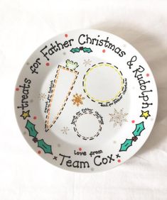 a white plate with christmas designs on it