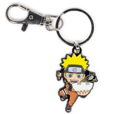 a keychain with a cartoon character holding a ball and a wrench on it