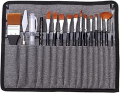 an assortment of makeup brushes in a gray case with zippered pouch on the side