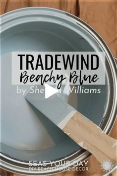 a close up of a paint pan with the words tradewind beachy blue on it