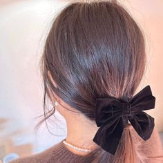 The black velvet bow hair clip offers a sophisticated and timeless look, crafted from soft, luxurious fabric.  This versatile accessory adds a touch of elegance to any hairstyle, making it suitable for both everyday wear and special occasions.  The secure clip ensures your hair stays in place while the classic black color complements a wide range of outfits, making it a must-have in your hair accessory collection. Adjustable Black Hair Accessories With Ears, Hair Bows Black, Black Silk Hair Bow, Black Satin Hair Bow, Black Velvet Hair Bow, Velvet Hair Bow, Black Velvet Bow, Hair Bow Sets, Hair Accessories Collection