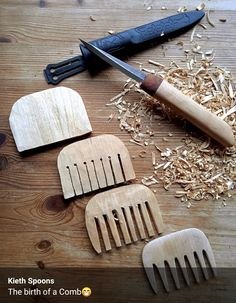 four wooden combs and two knives on a table