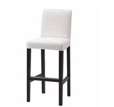 a white bar stool with black legs and a seat cushion on the back of it