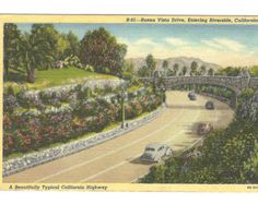 an old postcard with a bridge and flowers on it