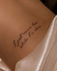 the back of a woman's stomach with an inscription on it that says, i love