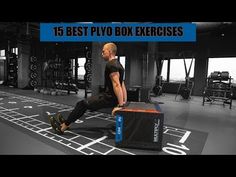 a man sitting on top of a box in a gym