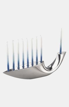 a menorah with blue candles on it