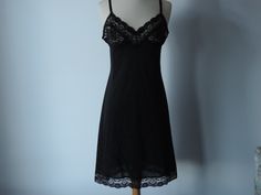 Vintage Vassarette Slip Dress.  Ladies Black Full Slip. Fabulous Black SATINESSENCE Lingerie.  The Lovely Full Slip is size 36 F and features adjustable straps.  label size 36 Please visit my Shop for Trendy Vintage Goods. https://www.etsy.com/shop/SevenSeven52Vintage Thank you so much!! Luxury Black Lace Slip Dress, Anthropologie Velvet Slip, Cheap Black V-neck Slip Dress, Affordable Black Spaghetti Strap Slip Dress, Vintage Slip, Black Slip Dress, Spokane Wa, Black Slip Ons, Made In Usa