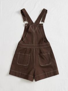 The Slant Pocket Romper is perfect for a stylish and professional look. This romper features a brown woven fabric with an overall style and slanted side pockets for added convenience. It has adjustable straps, a button closure, patched details, and a regular fit to flatter your figure. The high waistline offers additional comfort while the non-stretch cotton material provides durability. Wear this romper for any occasion and look polished yet effortless! Specifications: Color: Brown Details: Button, Patched, Pocket Sleeve Length: Sleeveless Neckline: Straps Fit Type: Regular Fit Waist Line: High Waist Fabric: Non-Stretch Material: Woven Fabric Composition: 100% Cotton Care Instructions: Machine wash or professional dry clean Product Measurements(cm): Size US Bust Hip Size Inseam Length Thi Overall Style, Look Polished, Professional Look, Stretch Cotton, Cotton Material, Woven Fabric, Adjustable Straps, Overalls, High Waist