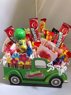 a green truck filled with candy and candies