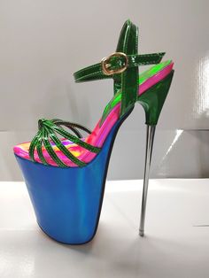 Green Heels With 4-inch Heel For Party, Green Open Heel Sandals For Night Out, Green High Heel Party Sandals, Green High Heel Sandals For Party, Green Open Toe Heels For Party, Green Platform Sandals For Party, Green Sandals With Heel Strap For Party, Green High Heels With Heel Loop, Green High Heel Shoes With Heel Loop