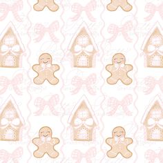 gingerbread cookies with pink bows are on a white background