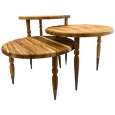 two wooden tables sitting next to each other