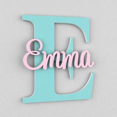 the letter d is made out of wood and has pink lettering that reads'emma '