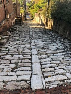 an old cobblestone street in the city