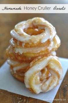 homemade honey cruller donuts stacked on top of each other