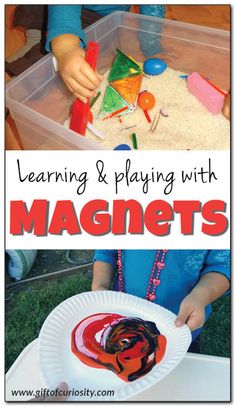 a child playing with magnets on a paper plate and in the background is a plastic container filled with sand