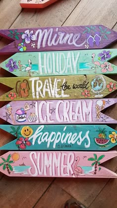 five wooden surfboards that say,'summer holiday travel the world ice cream happiness smile