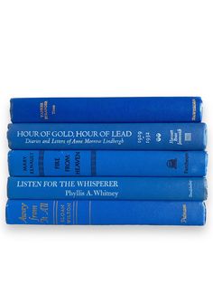 four blue books stacked on top of each other with the title hour of gold hour of lead