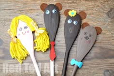 three wooden spoons with faces on them and the words let's make a puppet show