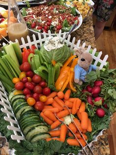 a table filled with lots of different types of vegetables