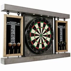 an image of a dart hitting in the center of two wooden boxes with darts on them