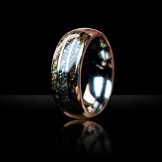 In the description area THE MATERIALS IN THIS RING ARE 100% REAL AND GUARANTEED AUTHENTIC Ring Name: The Stars Between Us RING INFORMATION Ring Name: The Stars Between Us Inlay: T-Rex, Nantan Meteorite, Triceratops Width: 8mm Sleeve: Tungsten Tri Channel Profile: Dome Finish: Polished Fit: Comfort Fit **Please read in its entirety. We know it's boring but it lists the policies. SIZING: Due to the tungsten/titanium/black ceramic/precious metal bands and the special nature of your rings inlay thes Channel Profile, Dinosaur Bone Ring, Meteorite Wedding Band, Fossil Ring, Unique Wedding Band, Fossil Bones, Bone Ring, Meteorite Ring, Dinosaur Bones