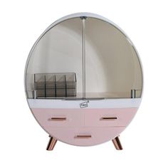 a pink and white round object with two drawers on it's sides, in front of a white background