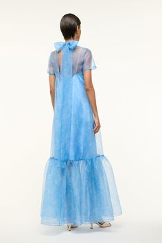 The Calluna Dress is a high neck organza gown with scoop back and functional neck tie. This style features a tiered skirt ruffle hem. Organza Gown, Organza Gowns, Skirt Ruffle, Blue Rose, Tiered Skirt, Dress Blue, Ruffle Hem, Blue Dresses, Neck Tie