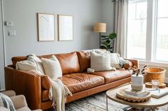 a living room filled with lots of furniture and decor