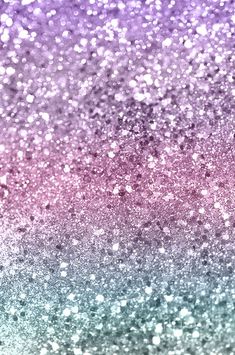 an abstract background with glitter in pink, purple and blue