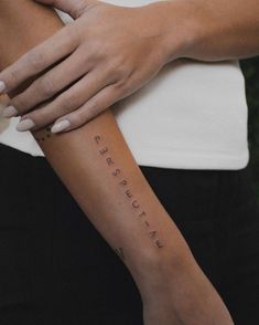 a woman's arm with an inscription on it that says, love is special