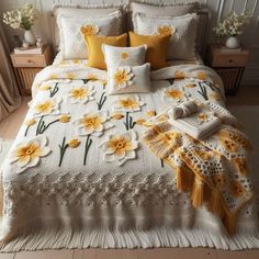 a bed with yellow and white flowers on it