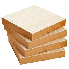 four wooden boards stacked on top of each other