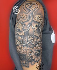 a man's arm with an elephant and flower tattoo on it, which reads make mom beautiful