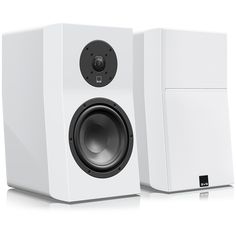 a pair of white speakers sitting next to each other