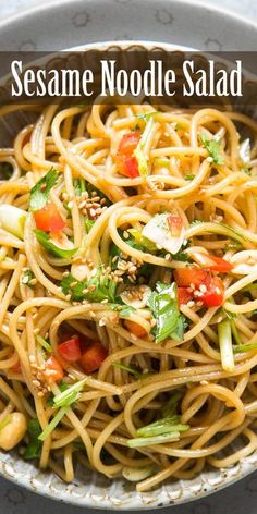 sesame noodle salad in a bowl with the words sesame noodle salad above it