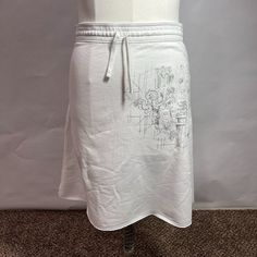 New Without Tags White Drawstring Waist, A-Line, New York City Marathon-Themed Skirt. Silver Metallic Embroidery And Edge Stitching On Raw-Cut Hem 95% Cotton / 5% Spandex Flat Lay Measurements (Inches)... Waist 16 Length 20 White Drawstring Skirt For Spring, Casual Cotton Skirt With Drawstring, Spring White Skirt With Drawstring, Casual Nike Lined Skirt, Casual Fitted Nike Skirt, Nike Fitted Casual Skirt, Nike Casual Skirt Bottoms, Nike Casual Stretch Skirt, Nike Summer Lined Skirt