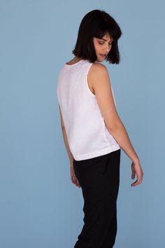 "MsWrinkle's clothing - from human to human. 100% handmade. *Description* - Sleeveless linen top with crew neckline and seam on the front and back; - High quality European linen; - Washed and softened (doesn't shrink anymore); - Medium weight linen (150 g/m2); - Our linen is OEKO-TEX certified that meets human ecological safety requirements; - Model is wearing size S in lavender violet, snow white, berry red, dusty pink, royal blue and elephant grey color (other sizes and colors please choose on Fitted Linen Tank Top For Spring, White Linen Casual Vest, Fitted Crew Neck Tank Top For Summer, Casual Cotton Tank Blouse, Spring Crew Neck Vest Top, Casual Linen Tank Vest, Summer Crew Neck Relaxed Fit Tank Top, Summer Vest Tops, Fitted Tank Tops For Summer