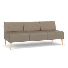 a beige couch with wooden legs on a white background