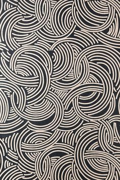 an abstract black and white pattern with wavy lines