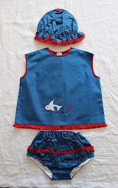 "VINTAGE 60's, stunning little summer set, top + bloomers + hat, petroleum blue poplin cotton canvas, red fringed edgings, \" fish appliqué and embroideries. Brand \" Kiba \", made in Belgium. Size 2 years Top : Length \" / Underarms \"  New old stock  I always refund overcharged shipping from 1 Euros overpaid ! Thank you for your visit" Beach Cotton Sets With Ruffles, Spring Cotton Sets With Embroidered Hem, Fitted Cotton Sets For Playtime, Red Cotton Sets, Embroidered Beach Sets For Spring, Fitted Cotton Summer Sets, Summer Cotton Sets With Embroidered Hem, Fitted Cotton Sets For Summer, Beach Embroidered Cotton Set