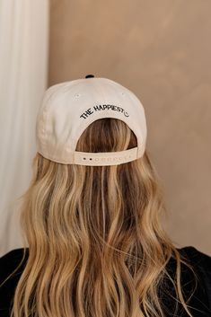 Elevate your headwear game with the God's Favorite Trucker Hat. Featuring a cream cap with a sleek black bill, this hat makes a bold statement. The front is embroidered with "God's Favorite" in stylish black embroidery, while the back adds a cheerful touch with "the happiest :)" also in black. With an adjustable back for a custom fit, this trucker hat combines comfort with a confident message, making it a standout accessory for any casual outfit. Embroidered Trucker Hats, Trucker Hat Sayings, Salon Merch, Trucker Hat Women, Real Estate Client Gifts, Trucker Hat Outfit, Faux Leather Purse, Black Embroidery, Travel Dress