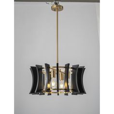 a black and gold chandelier hanging from the ceiling