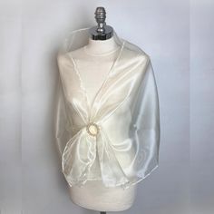 A very elegant organza shawl for your wedding party or evening dress. Made of light organza, slightly sparkles on the sun or light. Color: ivory or gold or blue green or black ( other colors are available ) Size : 150 cm x 48 cm approx   You can use it as a wrap, shawl or stola. WE have matching bags in our Etsy Shop! WE accept credit cards! Organza Shawl, Golden Scarf, Elegant Shawl, Wrap Shawl, 15 May, Wedding Matches, Deep Green, Beautiful Bags, Shawls And Wraps