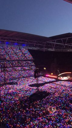 a stadium filled with lots of colorful lights