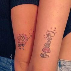 two people with matching tattoos on their arms